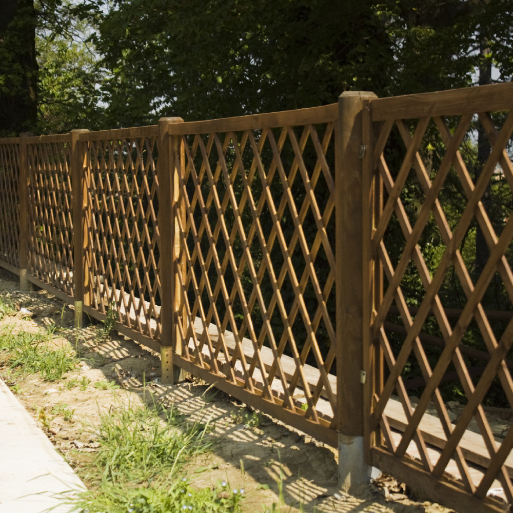 Come fissare una recinzione in legno Come fissare una recinzione in legno